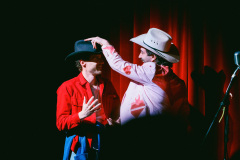 Adrian-the-only-person-to-shave-their-head-in-2024-gets-a-vintage-cowboy-hat-courtesy-of-Leos-Clothing-Supply